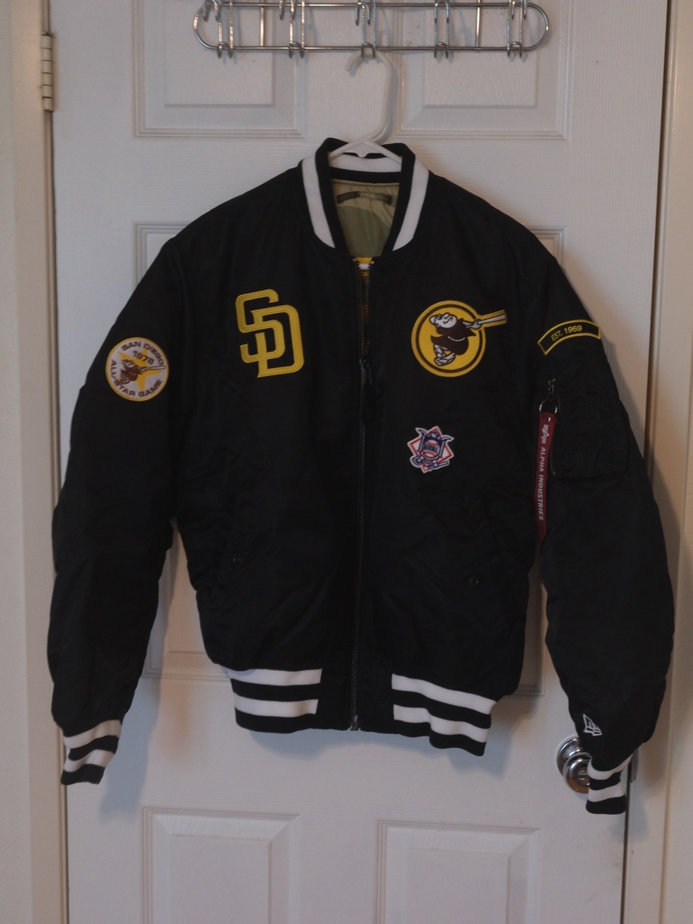 New Era Black Bomber Jacket with Yellow Team Patches
